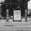 grayscale photography of Trivia night signage