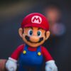 super mario in blue and red shirt figurine