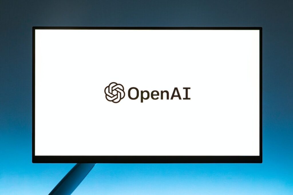 a computer screen with the open ai logo on it