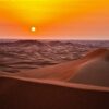 sand dunes during sunset