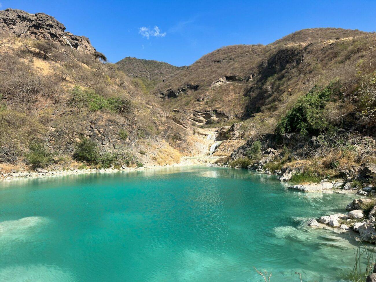 a large body of water surrounded by mountains