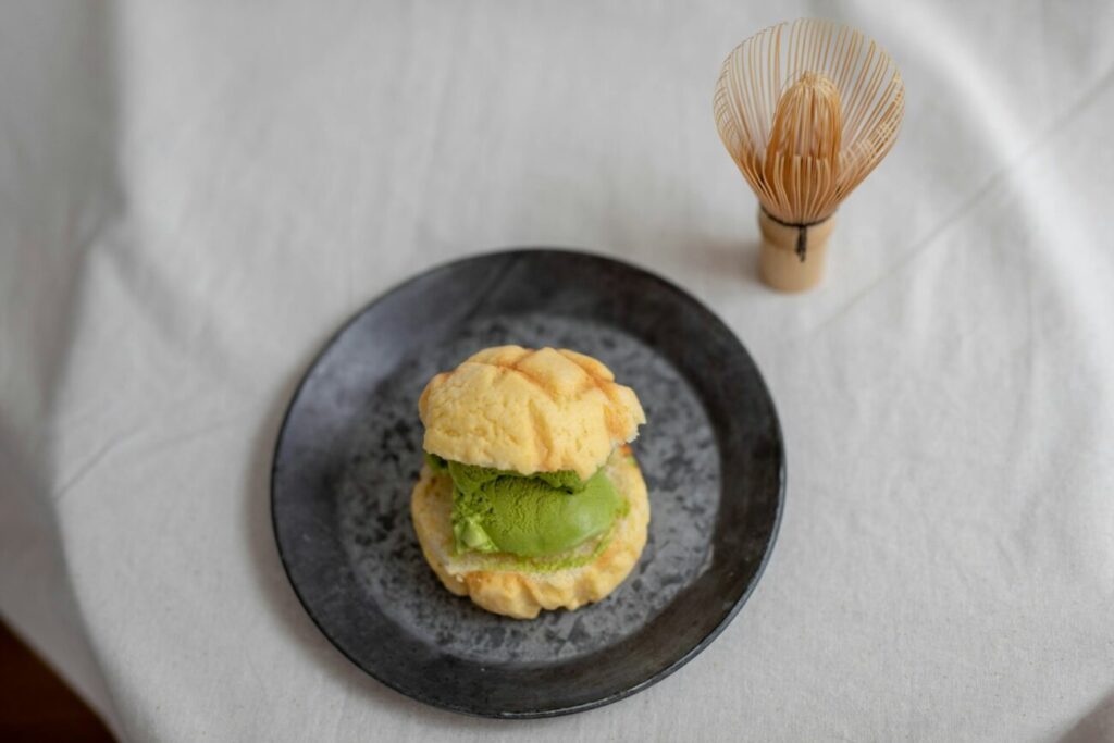 bread on black ceramic plate