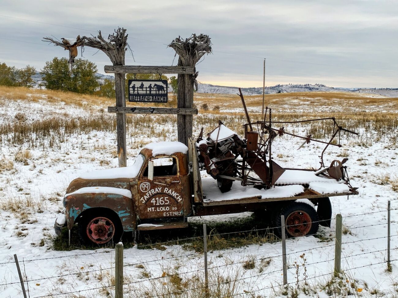 black and white vintage car on brown field during daytime