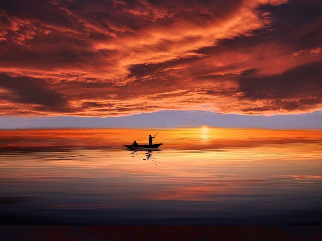 Boat Men Sunset Silhouettes Sky  - Guddanti / Pixabay