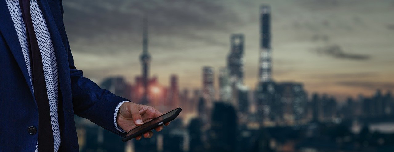 Businessman Phone Skyscraper Office  - geralt / Pixabay