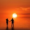 Couple Beach Sunset Romantic  - susan-lu4esm / Pixabay