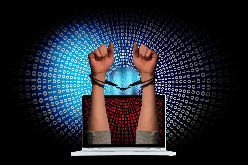 Crime Handcuffs Laptop Binary Code  - geralt / Pixabay