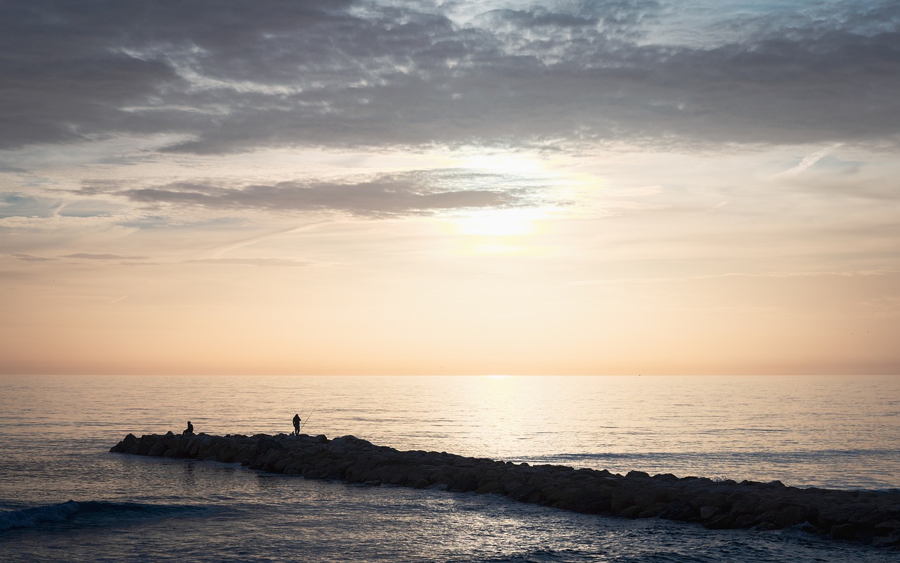 Fishermen Sea Sunset Fishing Rocks - ddzphoto / Pixabay