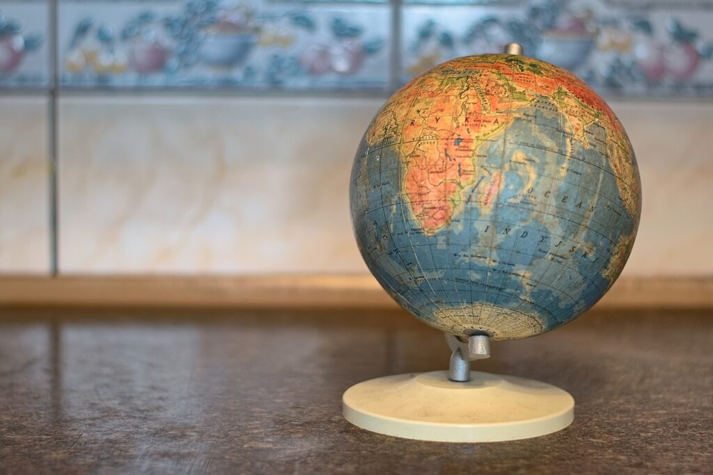 Globe Atlas Earth Map Cartography  - kostkarubika005 / Pixabay