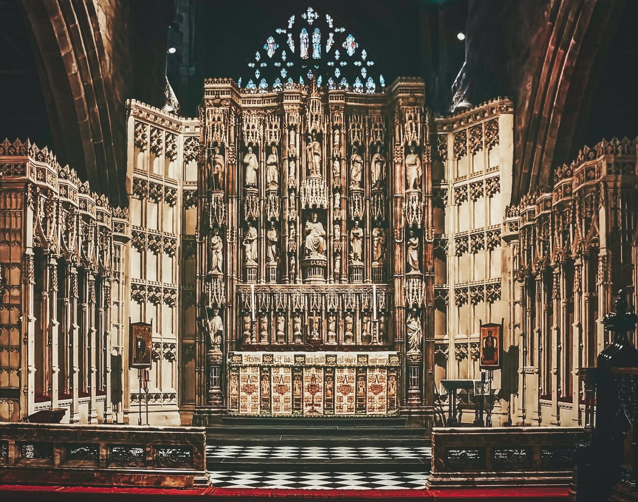 a large cathedral with a black and white checkered floor