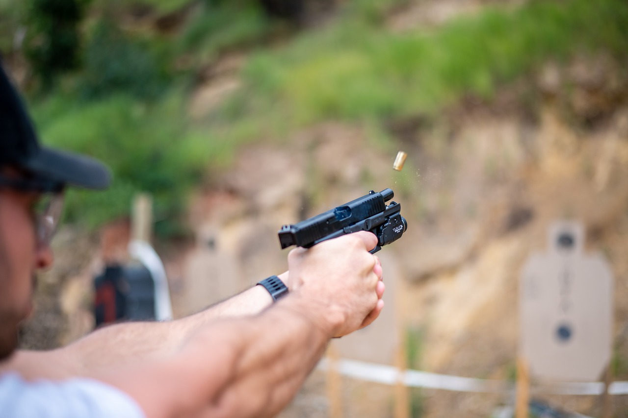 Gun Bullet Shooting Hand Gun Man  - paulsaa / Pixabay