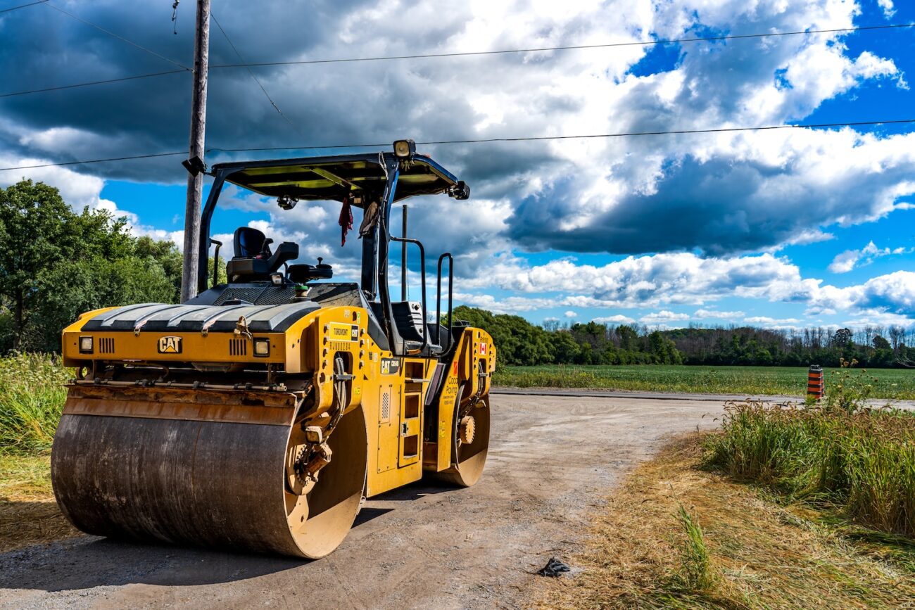 a large yellow vehicle on a road