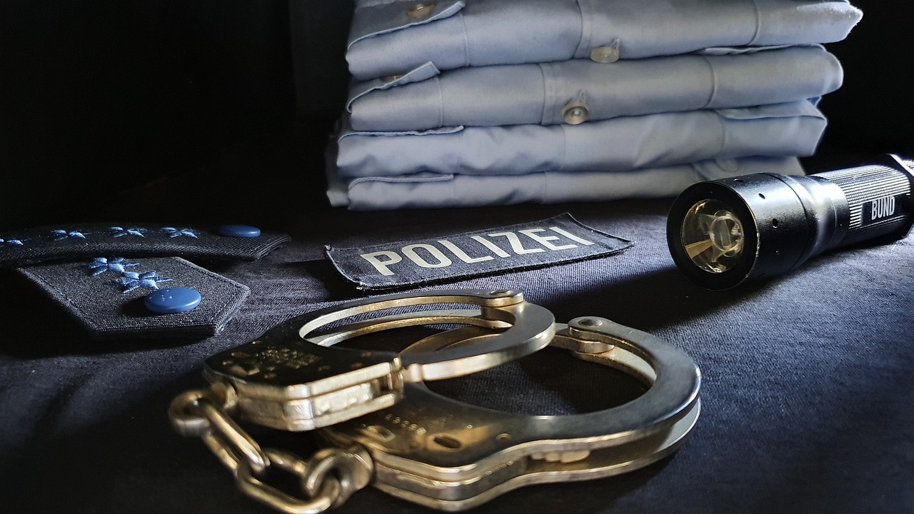 Handcuffs Uniform Police Cop - dennisweiland / Pixabay