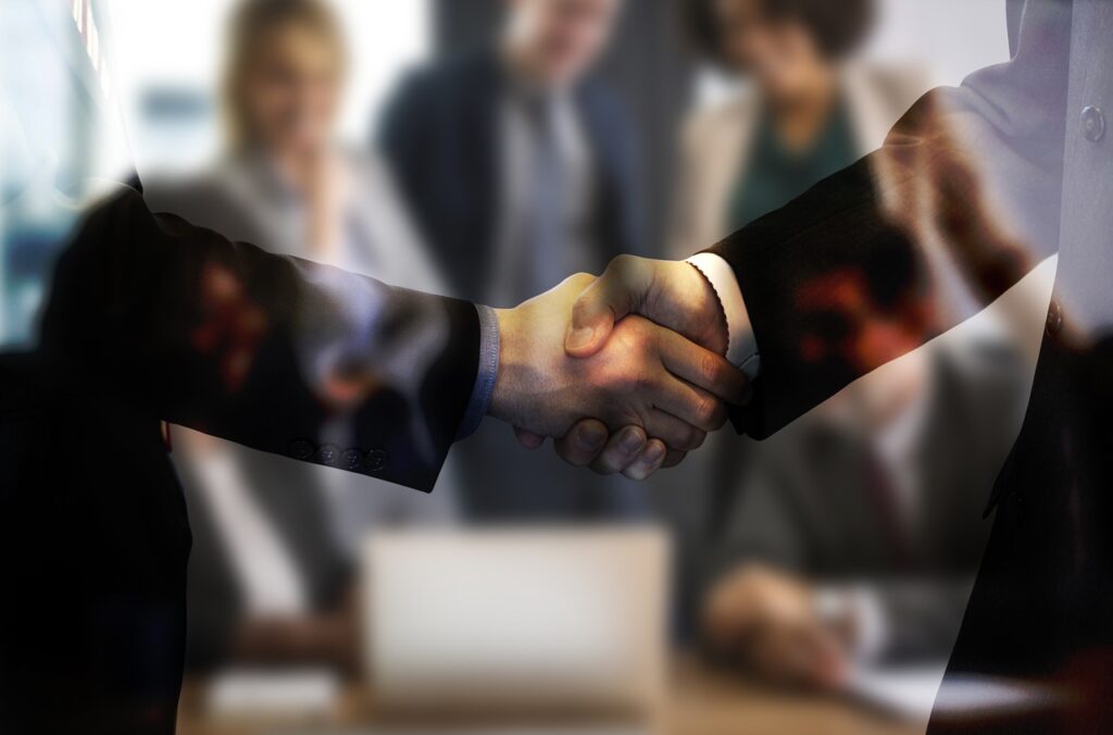 Handshake Agreement Businessmen  - geralt / Pixabay