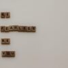 scrabble tiles forming be fearless be you phrase