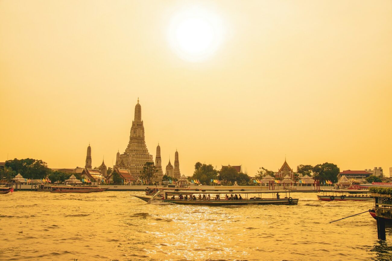 people walking on bridge over body of water during daytime