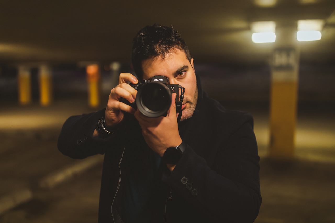 Man Camera Lens Face Photographer  - atilla_ / Pixabay