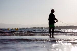 Man Fishing Beach Silhouette  - Estebanescu / Pixabay