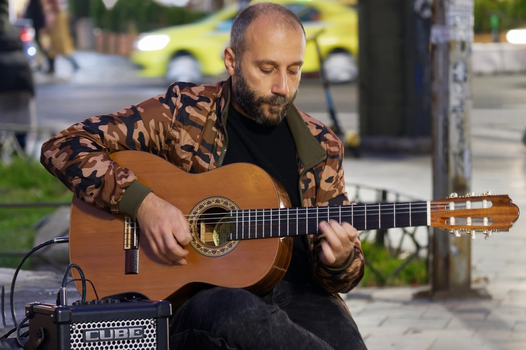 Man Guitarist Street Performance  - Surprising_Shots / Pixabay