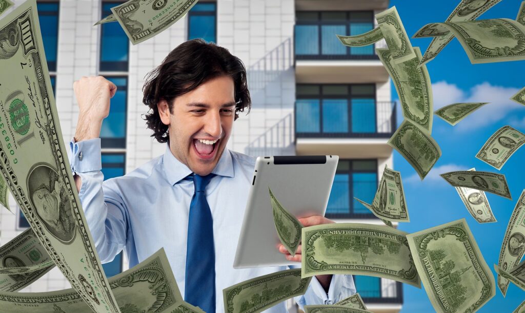 Man Money Tablet Bet Success Win  - Tumisu / Pixabay