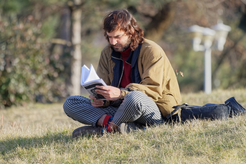 Man Park Reading Book Outdoors  - Surprising_Shots / Pixabay