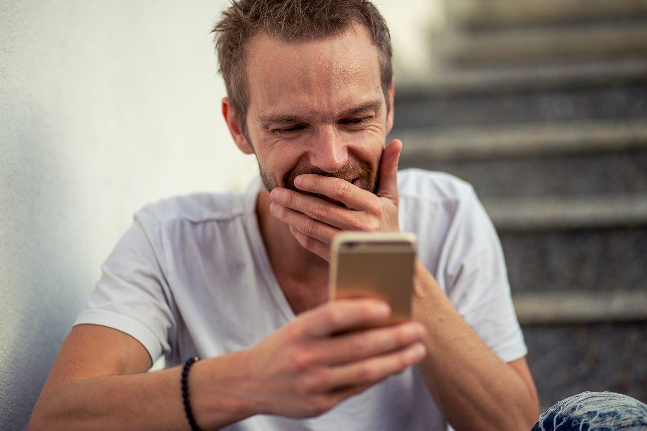 Man Phone Smartphone Person Smile  - Sammy-Williams / Pixabay