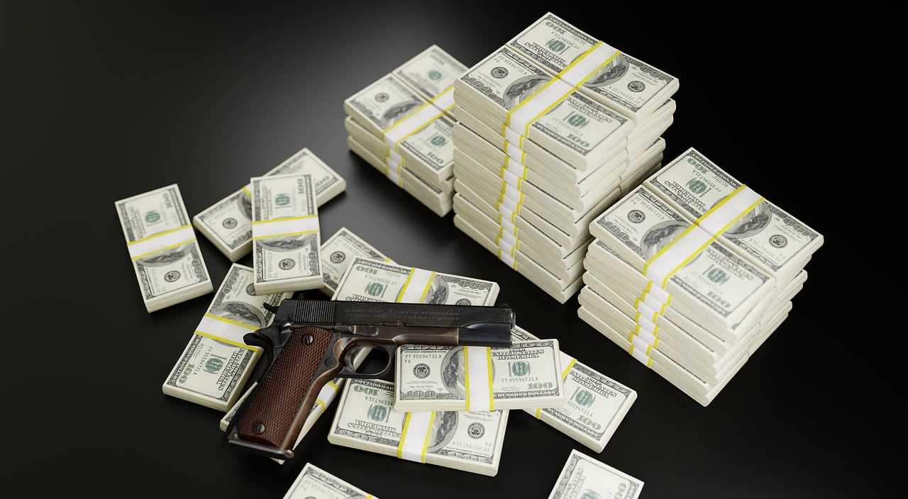 Money Dollars Gun Mafia Bribe  - QuinceCreative / Pixabay