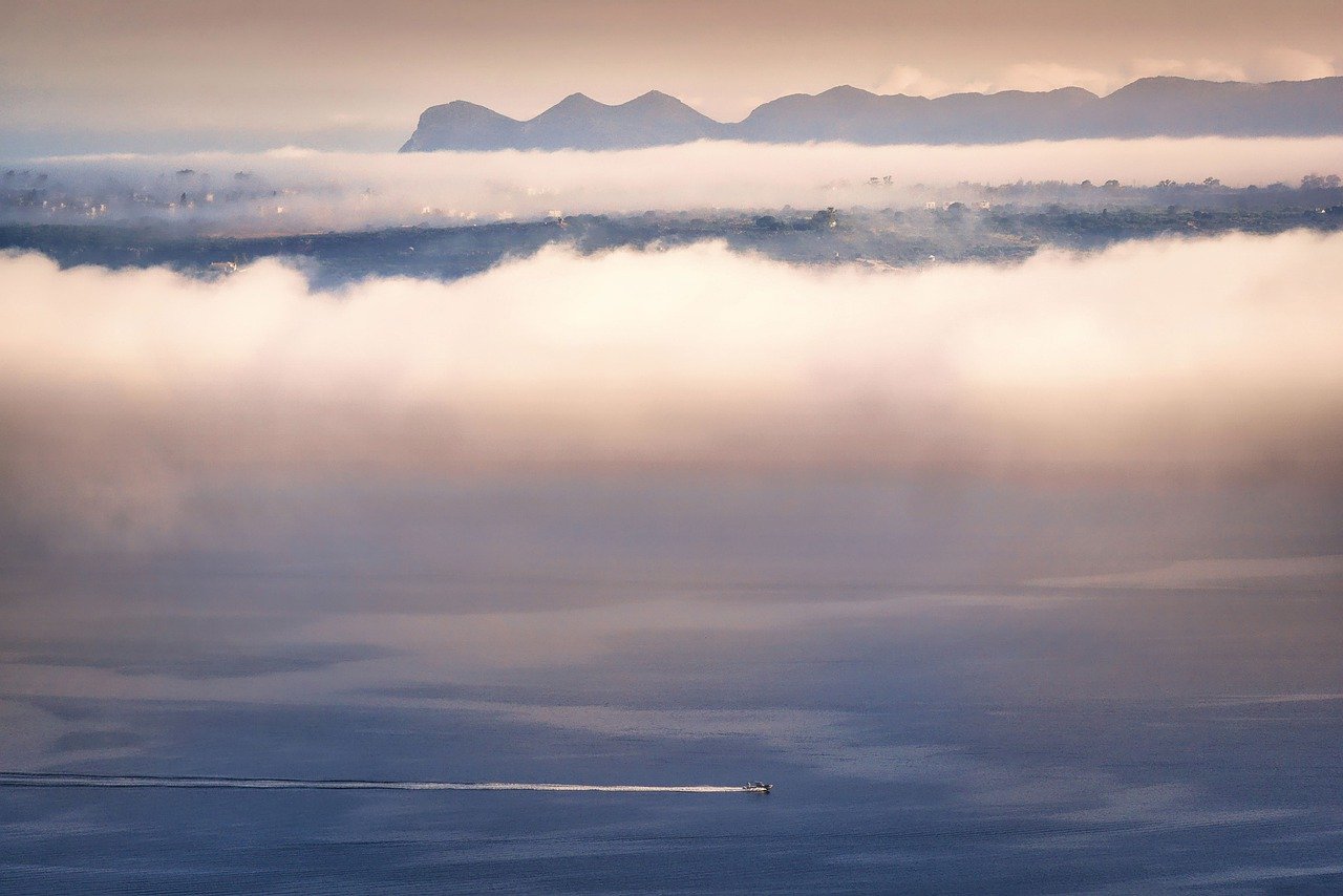 Mountains Town Trees Fog Haze Sea  - fietzfotos / Pixabay