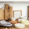 white ceramic bowls on brown wooden table