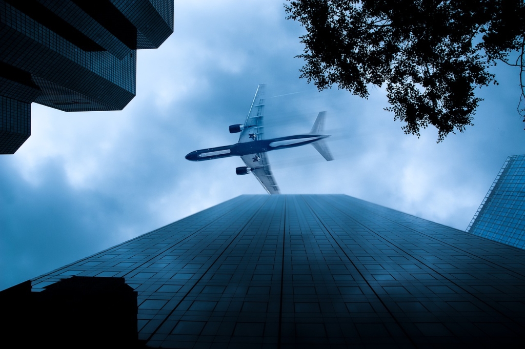 Plane Aircraft Buildings Metropolis  - pignatta / Pixabay
