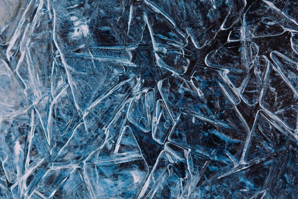 a close up of ice crystals on a surface