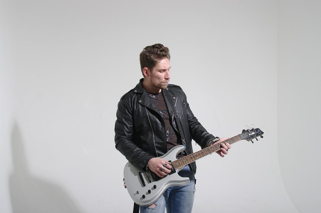 Rock Guitar Player Music Guitar  - ArtNar / Pixabay