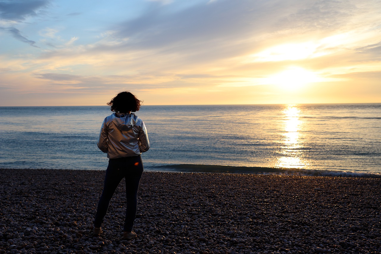 Sea Woman Beach Sunset Horizon  - mrsolow / Pixabay