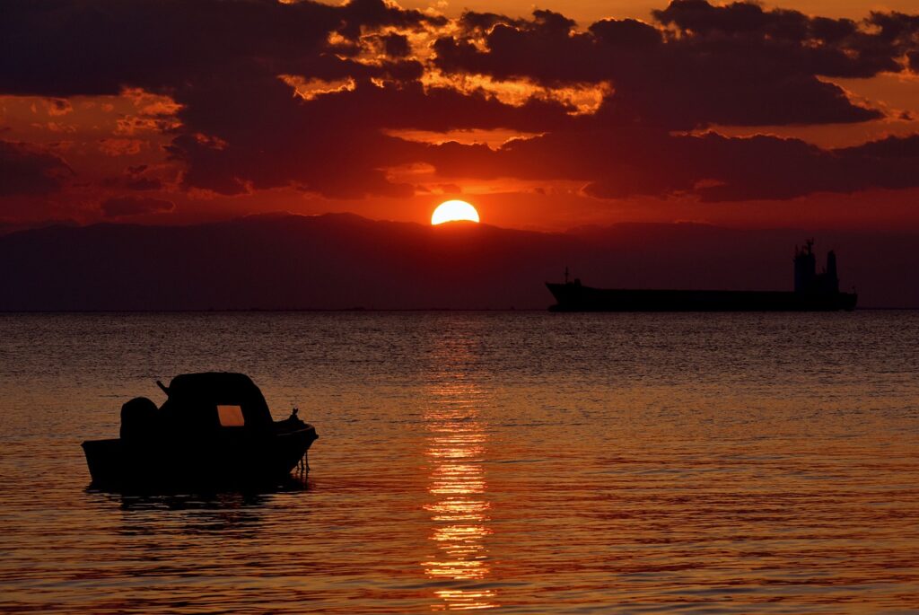 Sunset Sea Sky Water Sun Boat  - papazachariasa / Pixabay