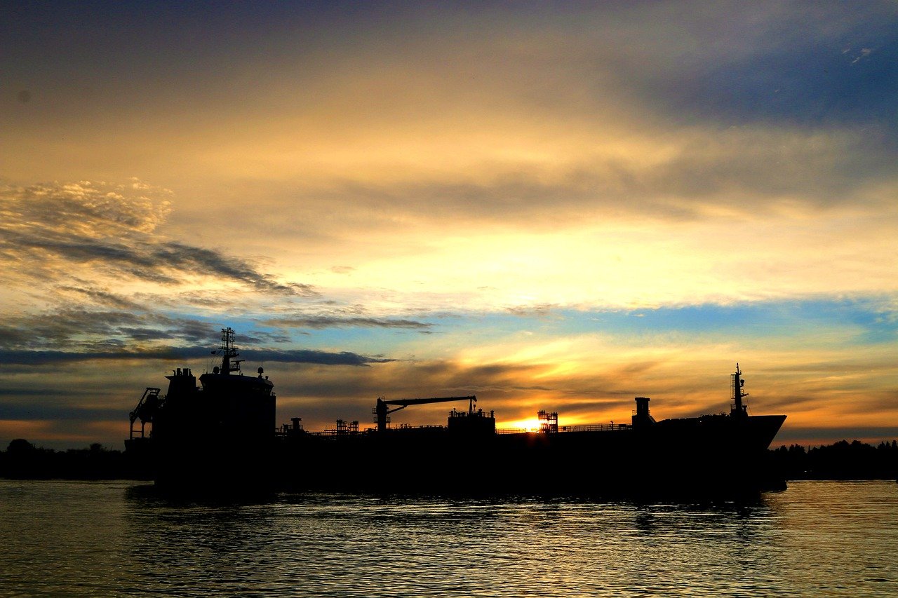 Sunset Ship River Silhouette  - wasi1370 / Pixabay