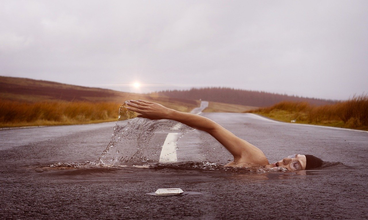 swimmer swim road street surreal 1678307
