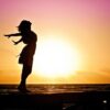 woman silhouette sunset beach sea 570883