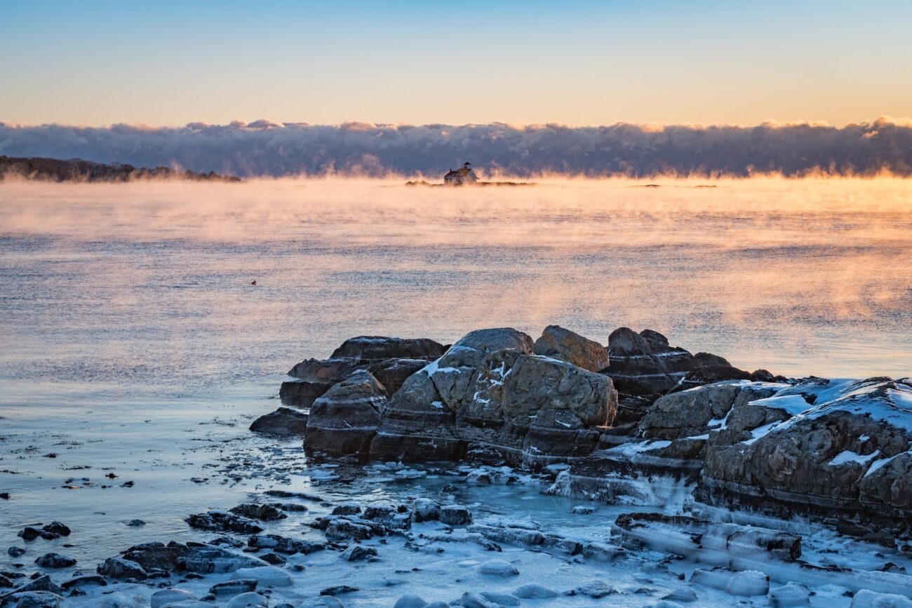 rocks on snow covered mountain
