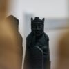 a statue of a man with a crown on his head